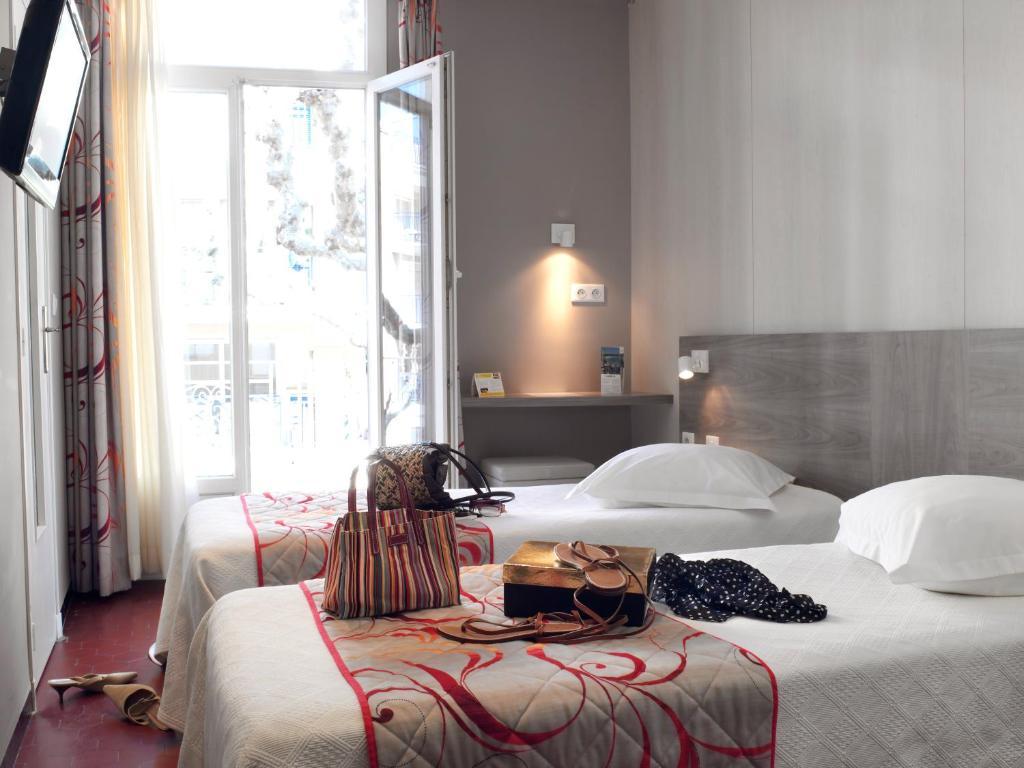 Brit Hotel Confort Le Revest Сент-Максім Номер фото